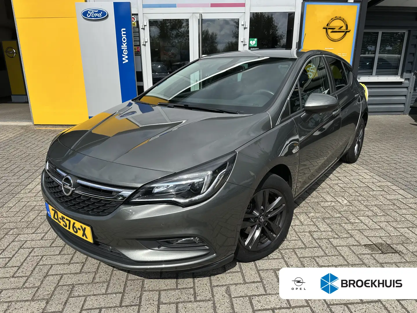 Opel Astra 1.0 105PK Turbo 120 Jaar Edition | NAVIGATIE| PARK Grijs - 1