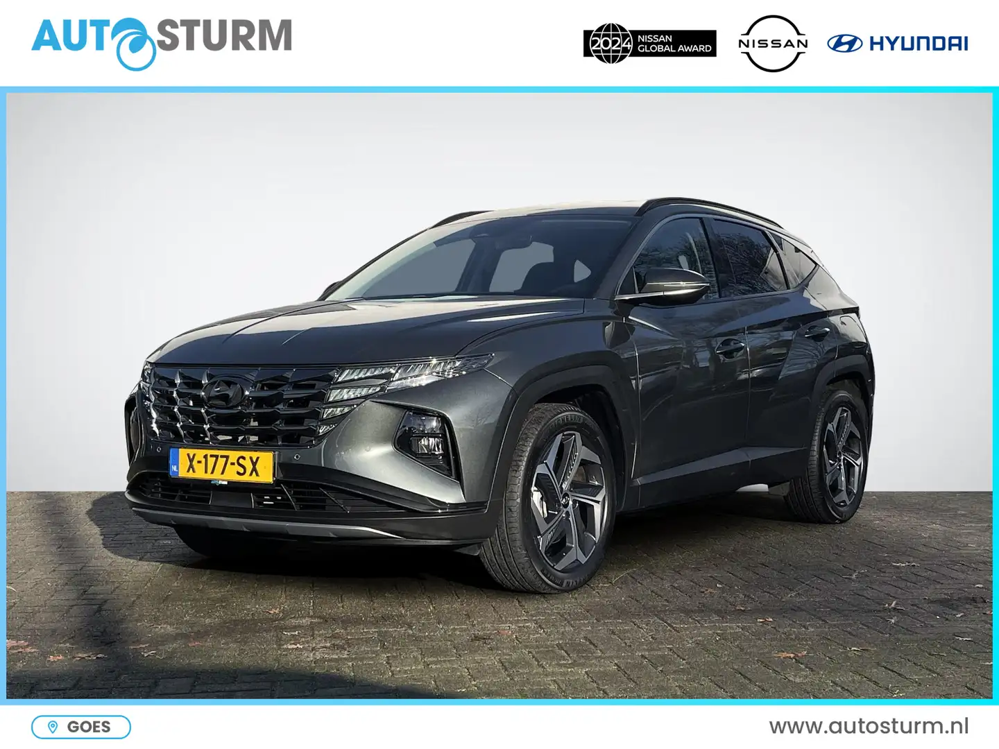 Hyundai TUCSON 1.6 T-GDI PHEV Comfort Smart 4WD | Navigatie | Cam Gris - 1