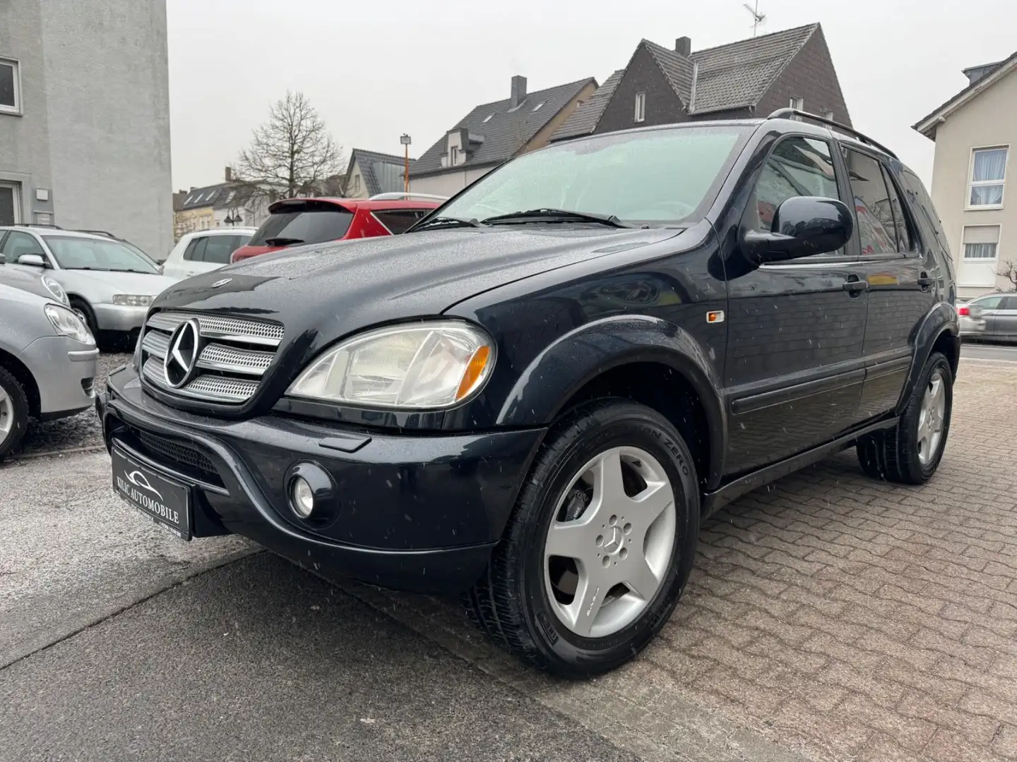 Mercedes-Benz ML 55 AMG 2.Hand*Navi*Xenon*AHK*Glasdach*Bose Black - 1