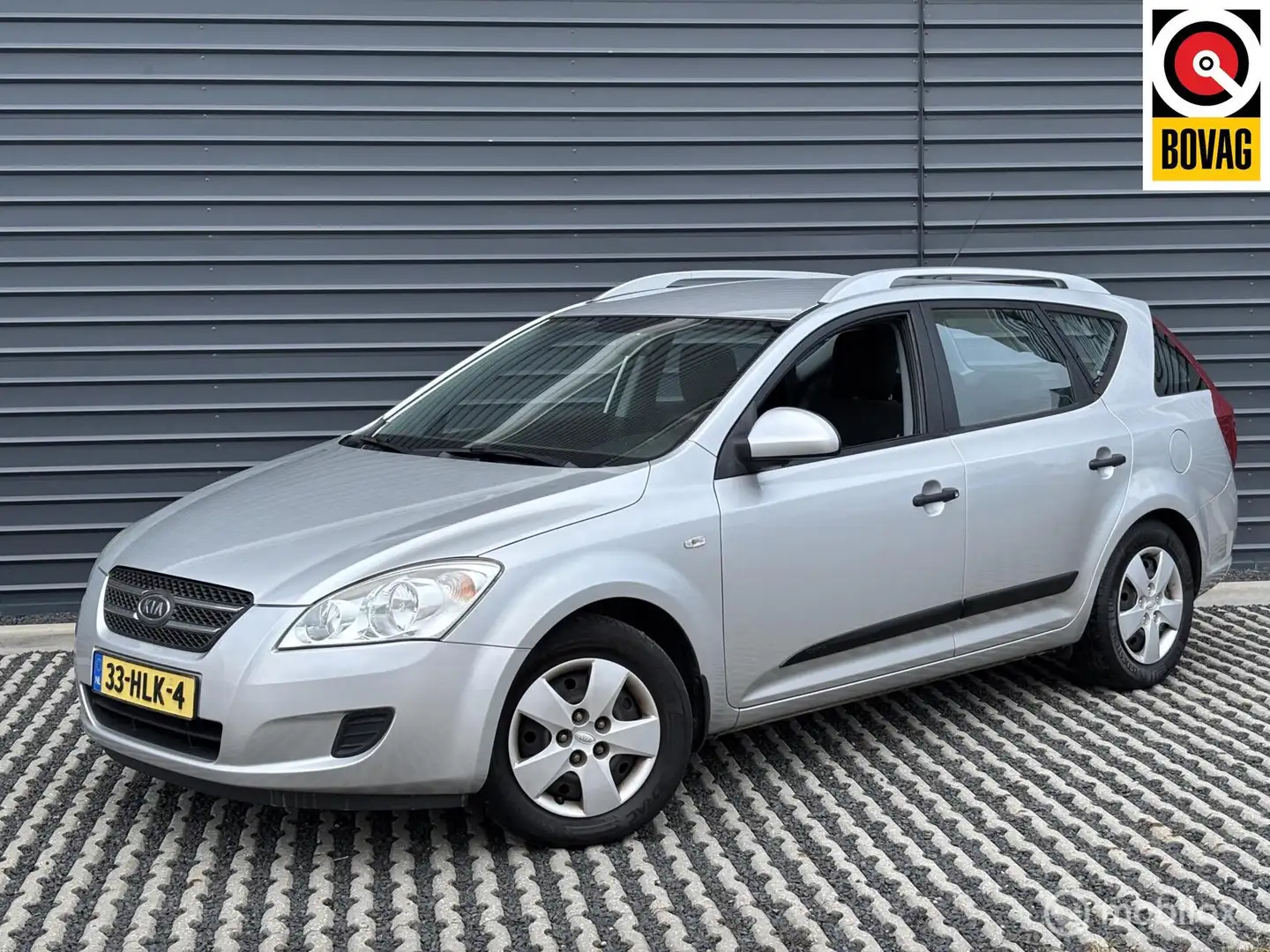 Kia Ceed / cee'd Sporty Wagon 1.4 X-tra | 1e eigenaar | Trekhaak Grijs - 1