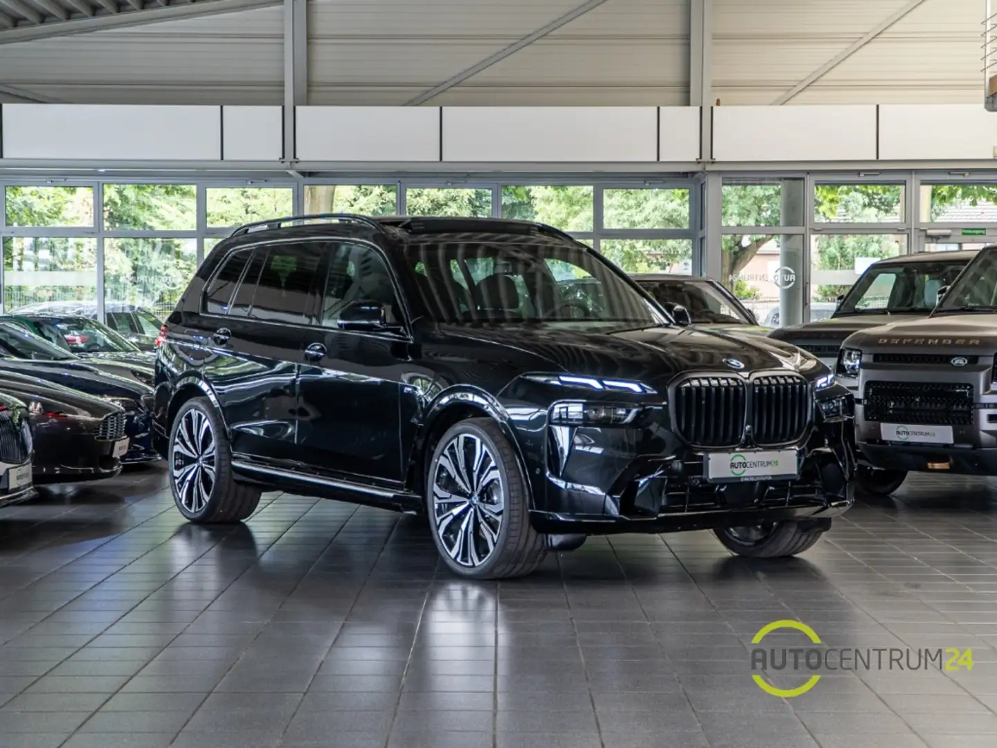 BMW X7 40d M Sport 7-Sitz Sky B&W AHK Komfort Schwarz - 1