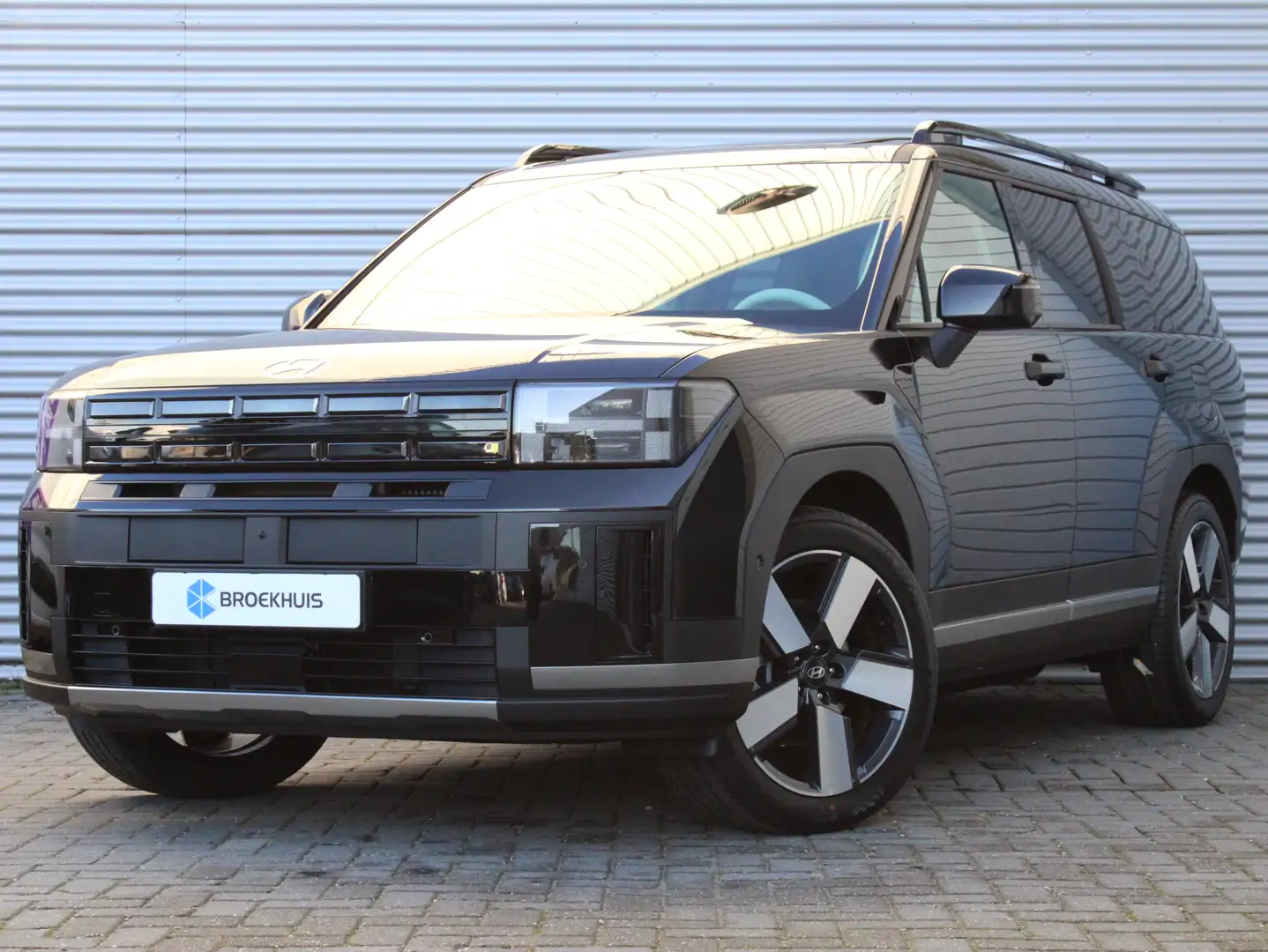 Hyundai SANTA FE 1.6 T-GDI HEV Premium Sky 7p. | Schuif-kantel Pano Zwart - 1