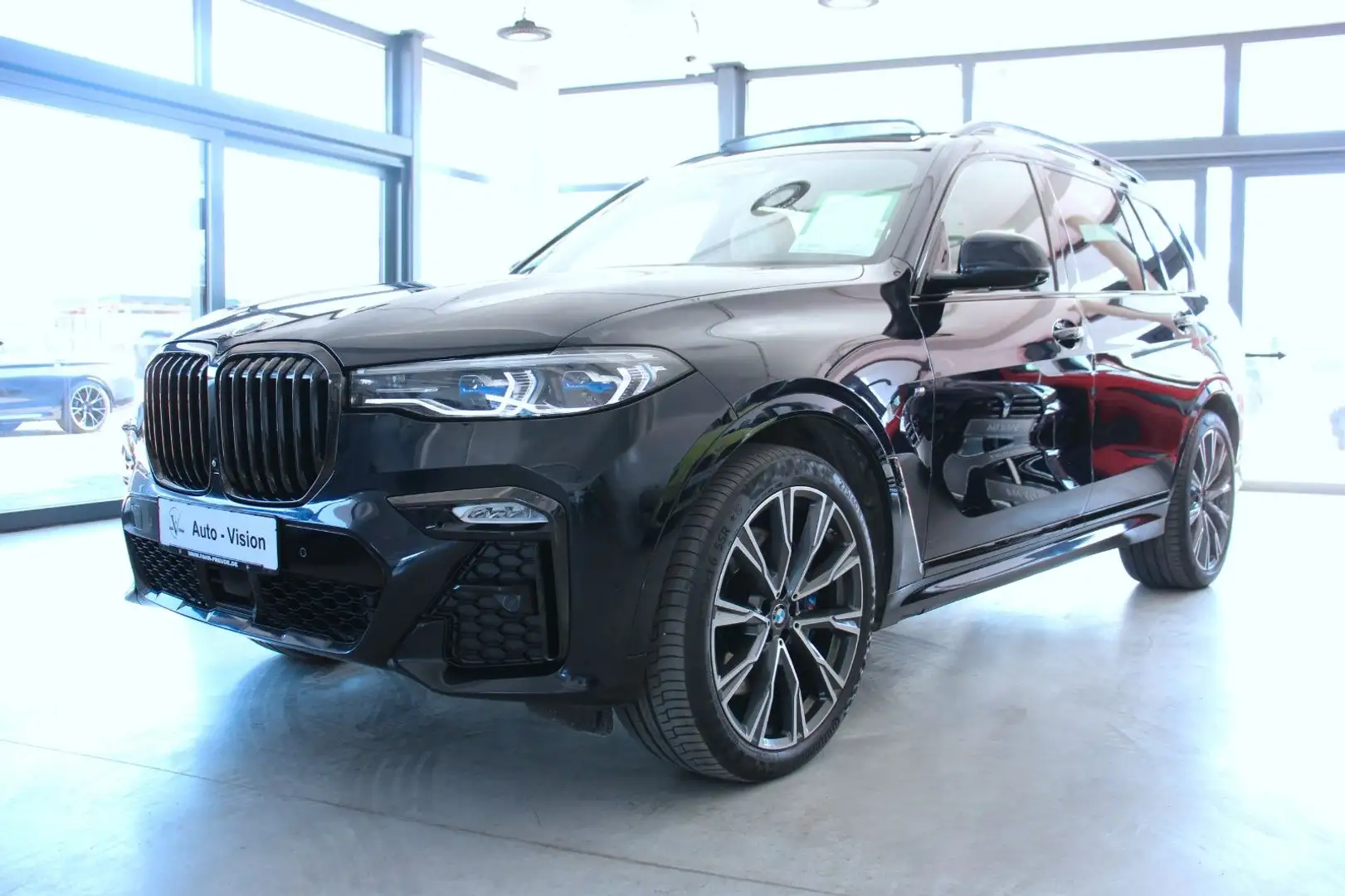 BMW X7 M50d *Laser*Panorama*AHK*ACC*Sthz*360°*7Sitze Schwarz - 1