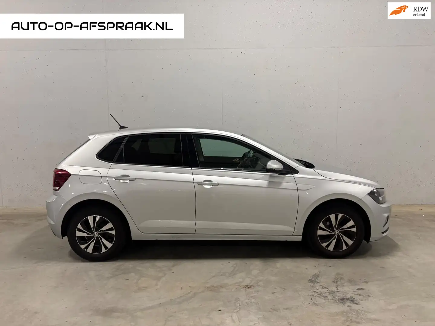 Volkswagen Polo 1.0 TSI Comfortline 5drs. N.a.v. Airco ACC Grijs - 1