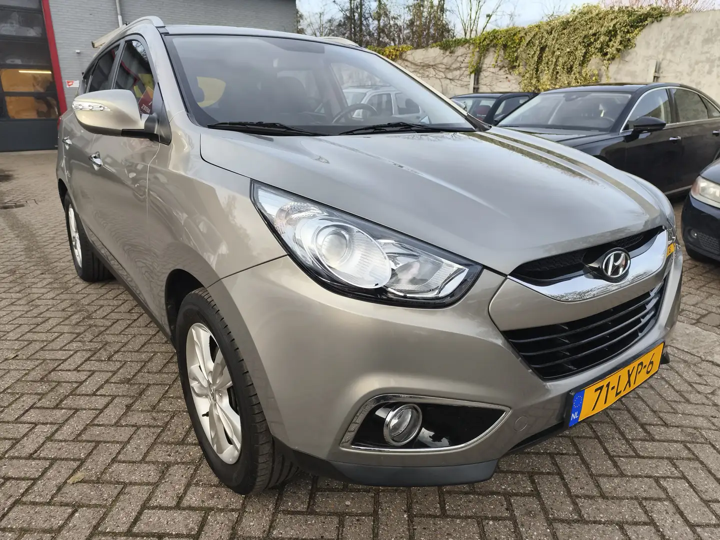 Hyundai iX35 2.0i CVVT StyleVersion 2WD, Trekhaak Grijs - 1