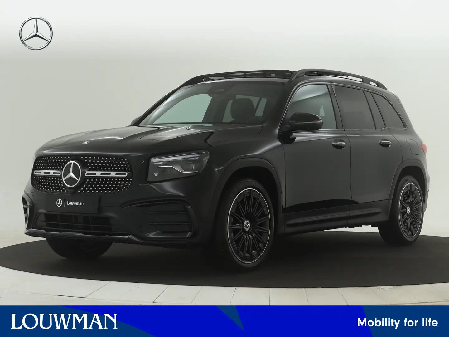 Mercedes-Benz GLB 200 AMG Line | Trekhaak | Nightpakket | Premium Plus p Zwart - 1