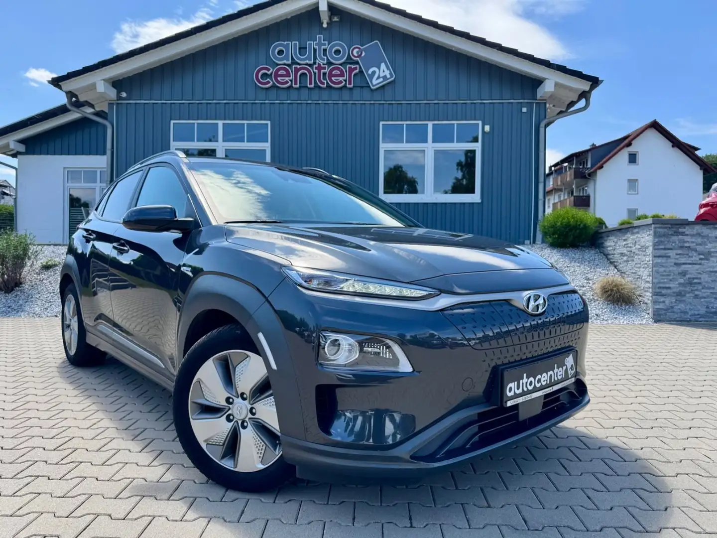 Hyundai KONA Style Elektro°64kWh°AHK°100% SOH°Kamera°LED Grau - 1