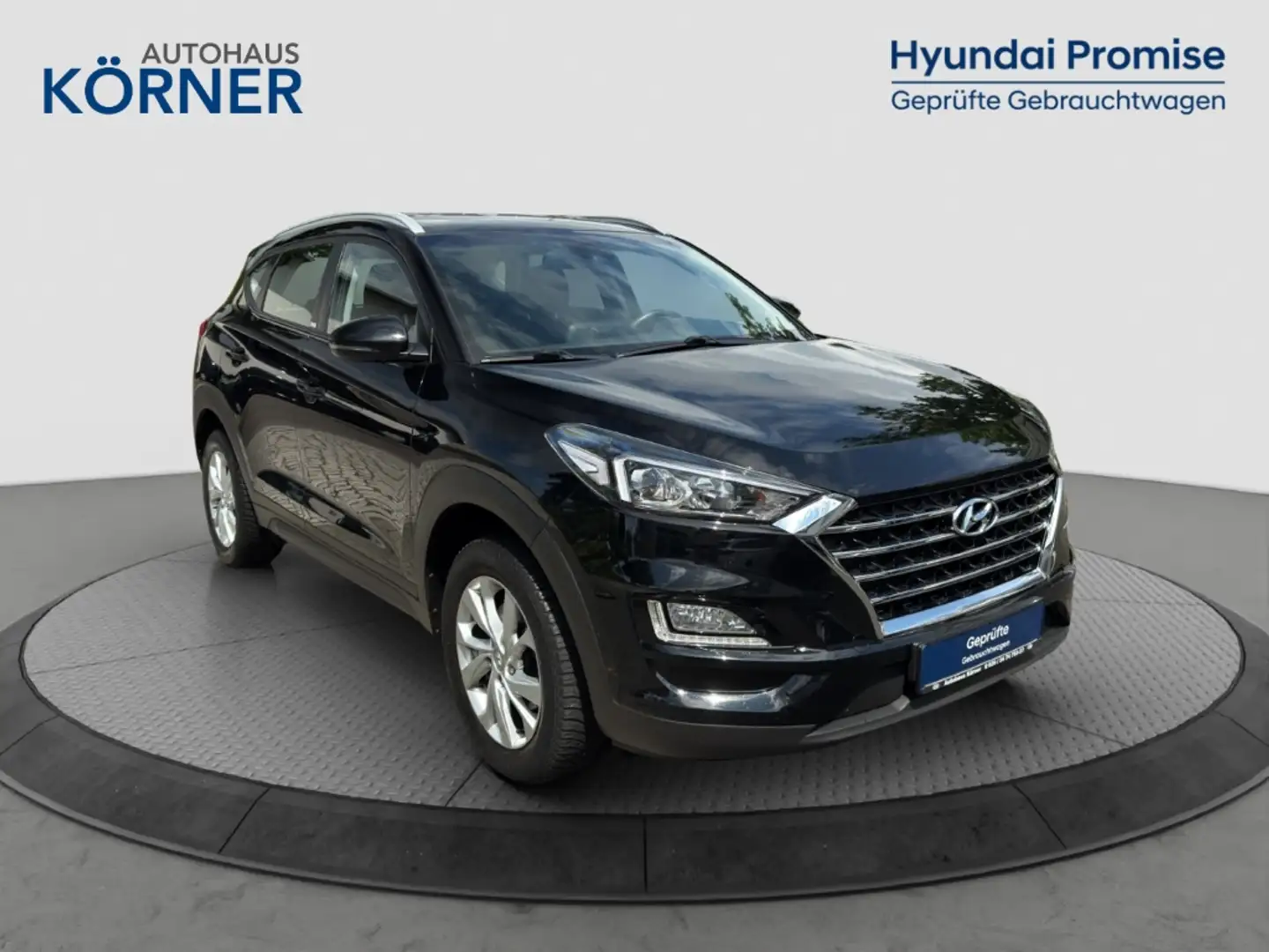 Hyundai TUCSON TREND 1.6 GDi *NAVI*CAM*SITZHZ*DAB*CARPLAY* Schwarz - 1