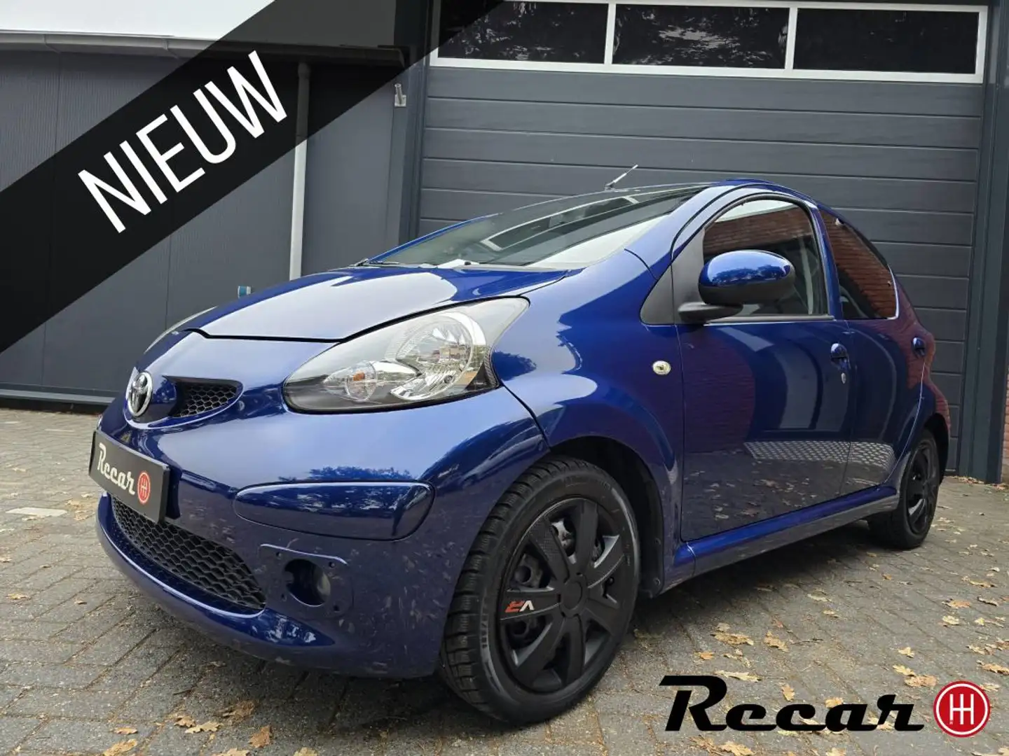 Toyota Aygo 1.0-12V Sport/Airco/5Drs/Sport!/Nap/Jvc. Blauw - 1