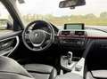BMW 330 3-serie Touring 330d xDrive High Executive Automaa Zwart - thumbnail 3
