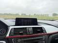 BMW 330 3-serie Touring 330d xDrive High Executive Automaa Zwart - thumbnail 24
