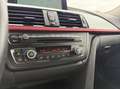BMW 330 3-serie Touring 330d xDrive High Executive Automaa Zwart - thumbnail 14