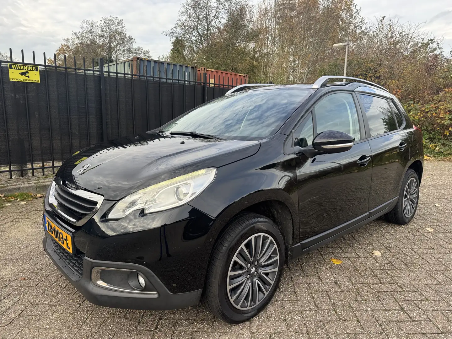 Peugeot 2008 1.2 VTi Active Airco/Cruise/PDC/Trekh Zwart - 1