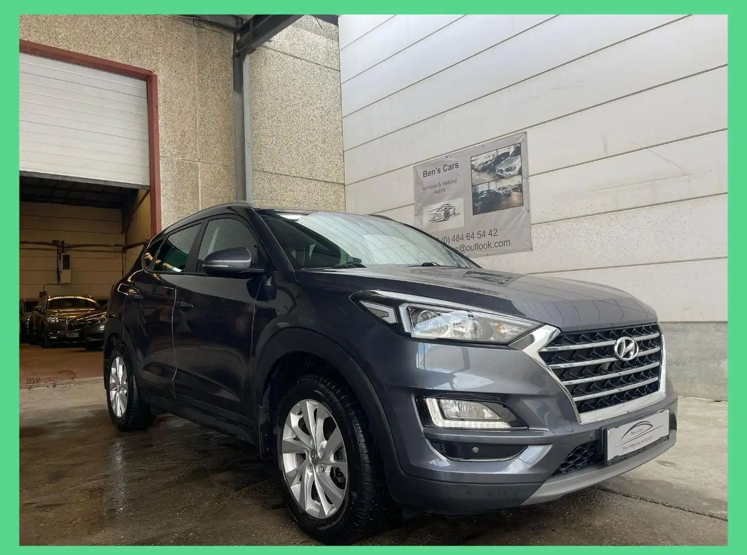 Hyundai TUCSON 1.6 CRDI 52.000KM *GPS/Camera * Grijs - 1