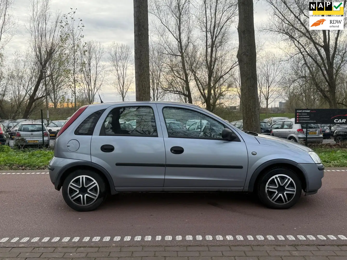 Opel Corsa 1.2-16V Essentia APK2026!LAGE KM!5DEURS! Gris - 1