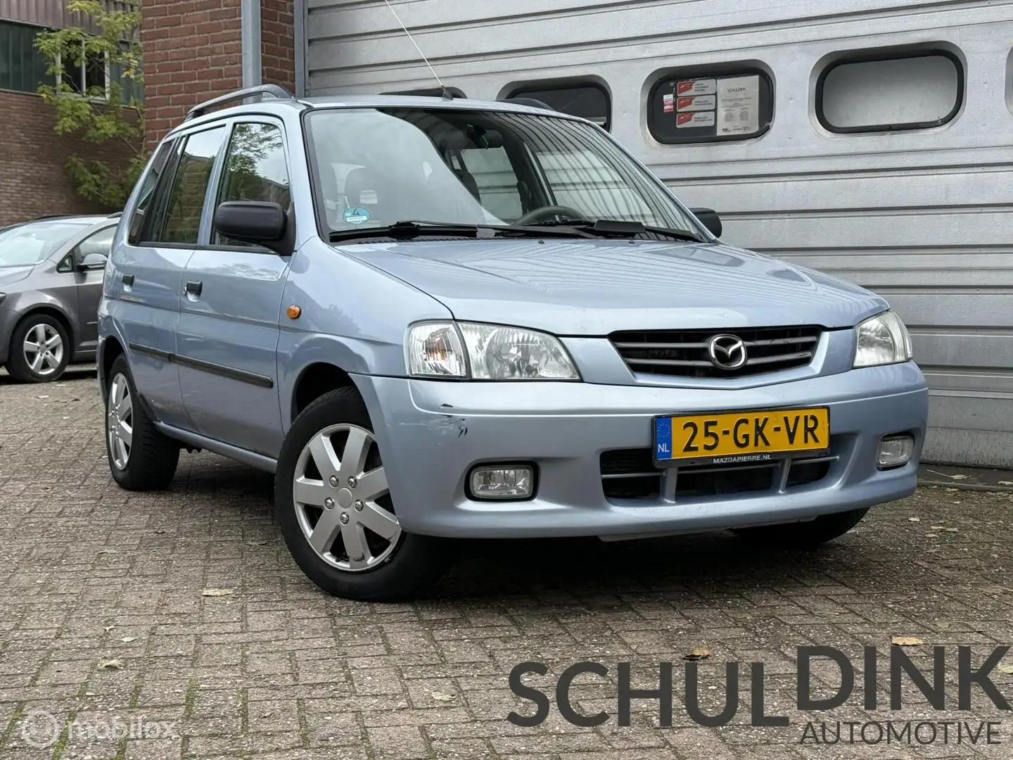 Mazda Demio 1.5 Touring AUTOMAAT|HOGE INSTAP|AIRCO Grijs - 1