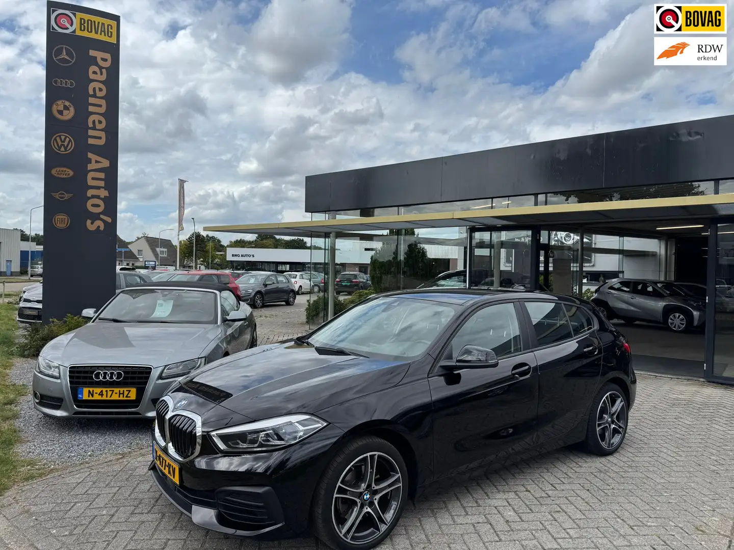 BMW 118 1-serie 118i High Executive|Navi|Carplay|Stoelverw Schwarz - 1