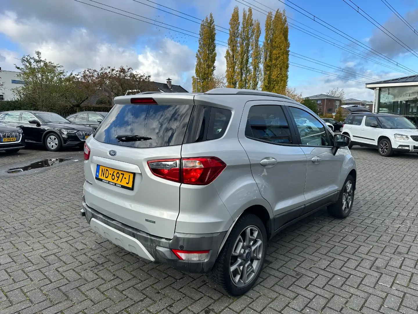Ford EcoSport 1.0 EcoB 92kw | Titanium | Airco-Ecc | Navi | Half Gris - 2