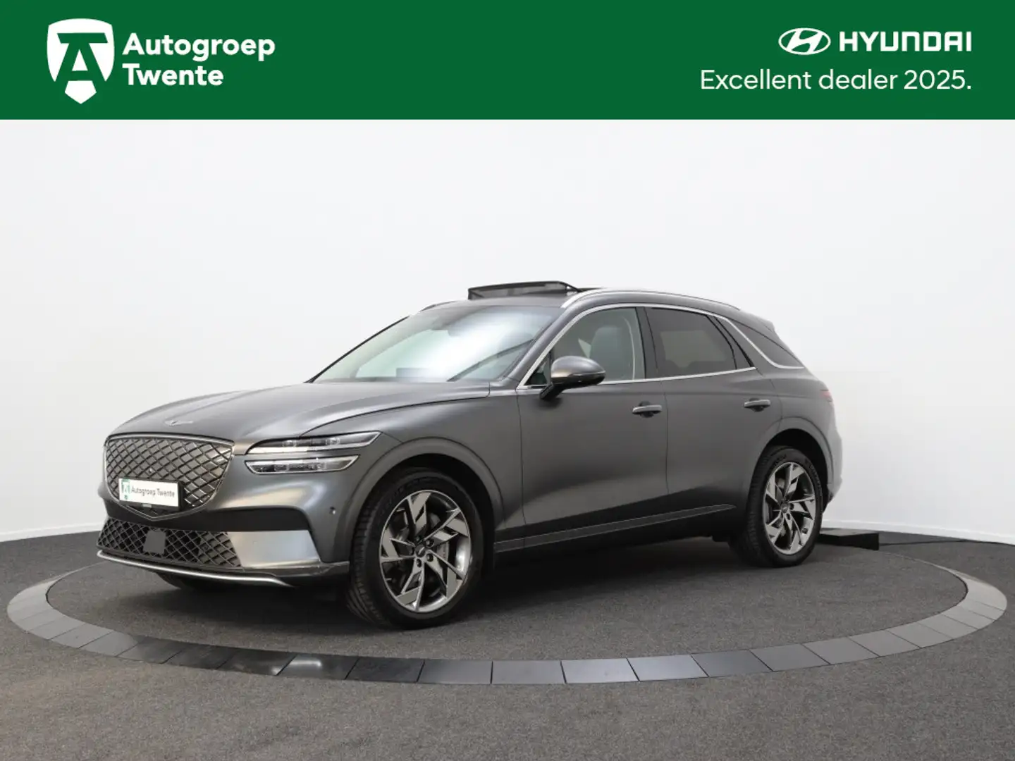 Genesis GV70 E Sport | Lexicon Audio | Nappa Leer | Outdoor Pac Gris - 1