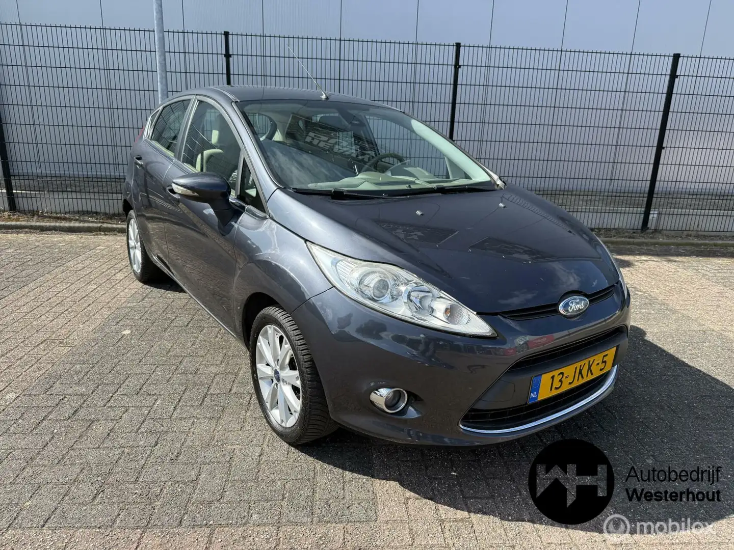 Ford Fiesta 1.25 Ghia Nieuwe APK Airco Cruise Control Grijs - 1