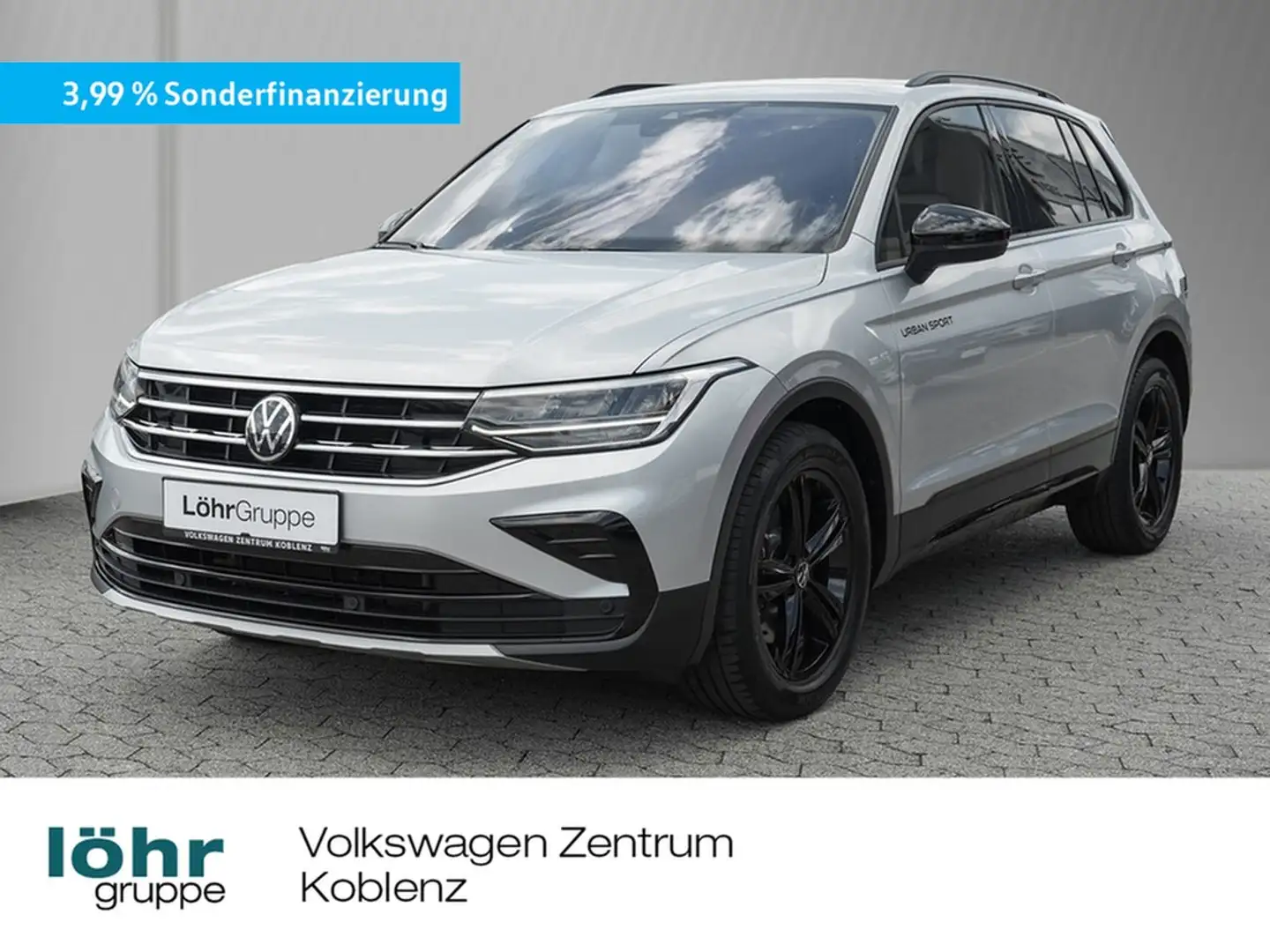 Volkswagen Tiguan 2.0 TSI DSG Urban Sport 4Mo AHK/Navi/RFK Silber - 1