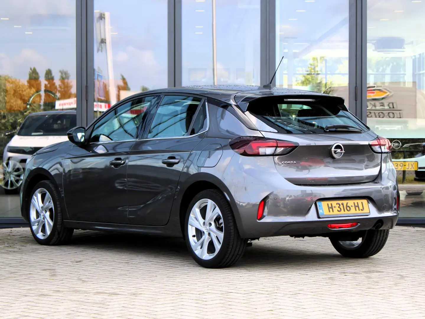 Opel Corsa 1.2 Elegance | Navi / Climate / Cruise Grijs - 2