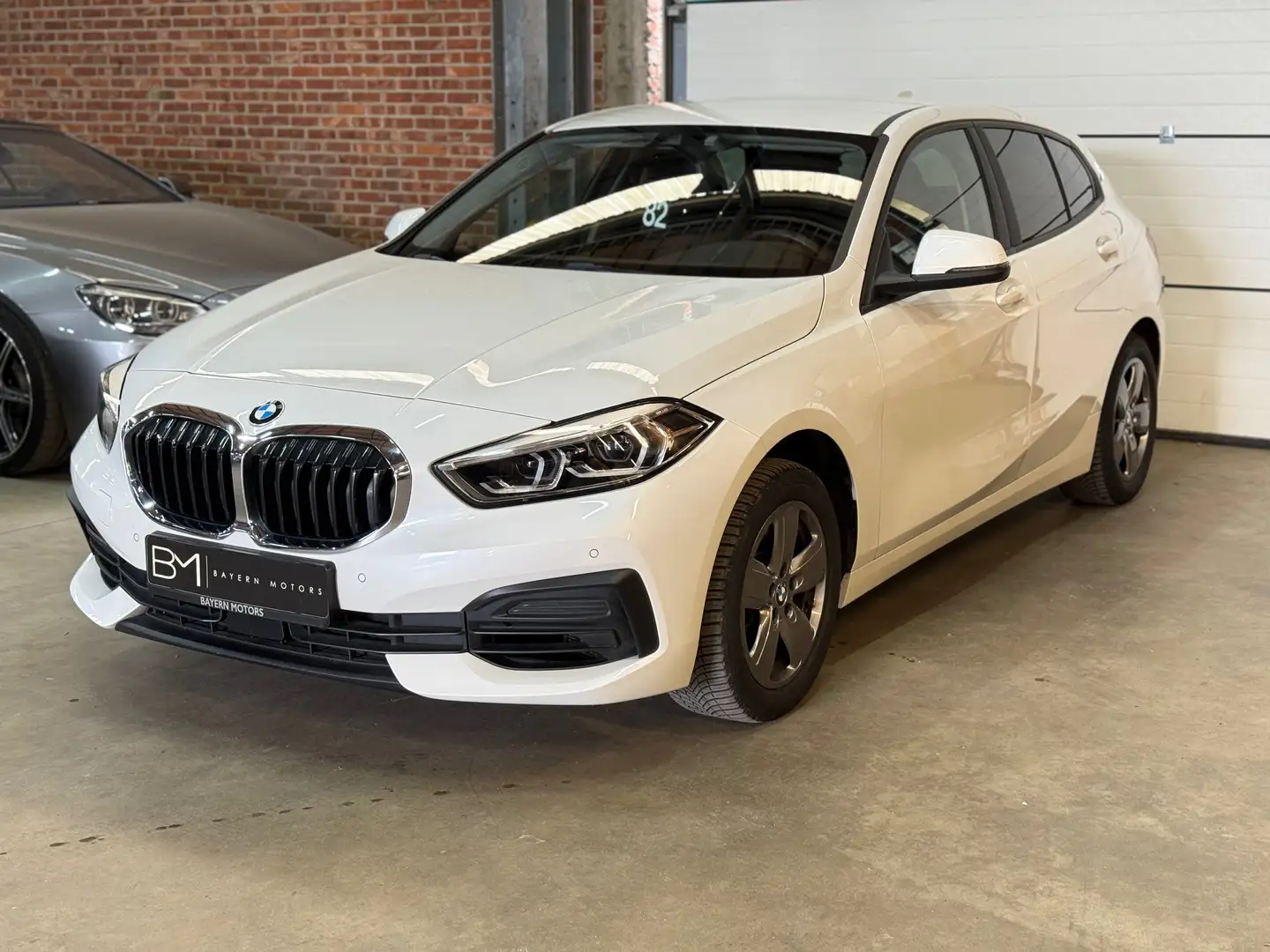 BMW 116 iA Automaat CarPlay Navi LED Benzine 2021 116000km Bianco - 1