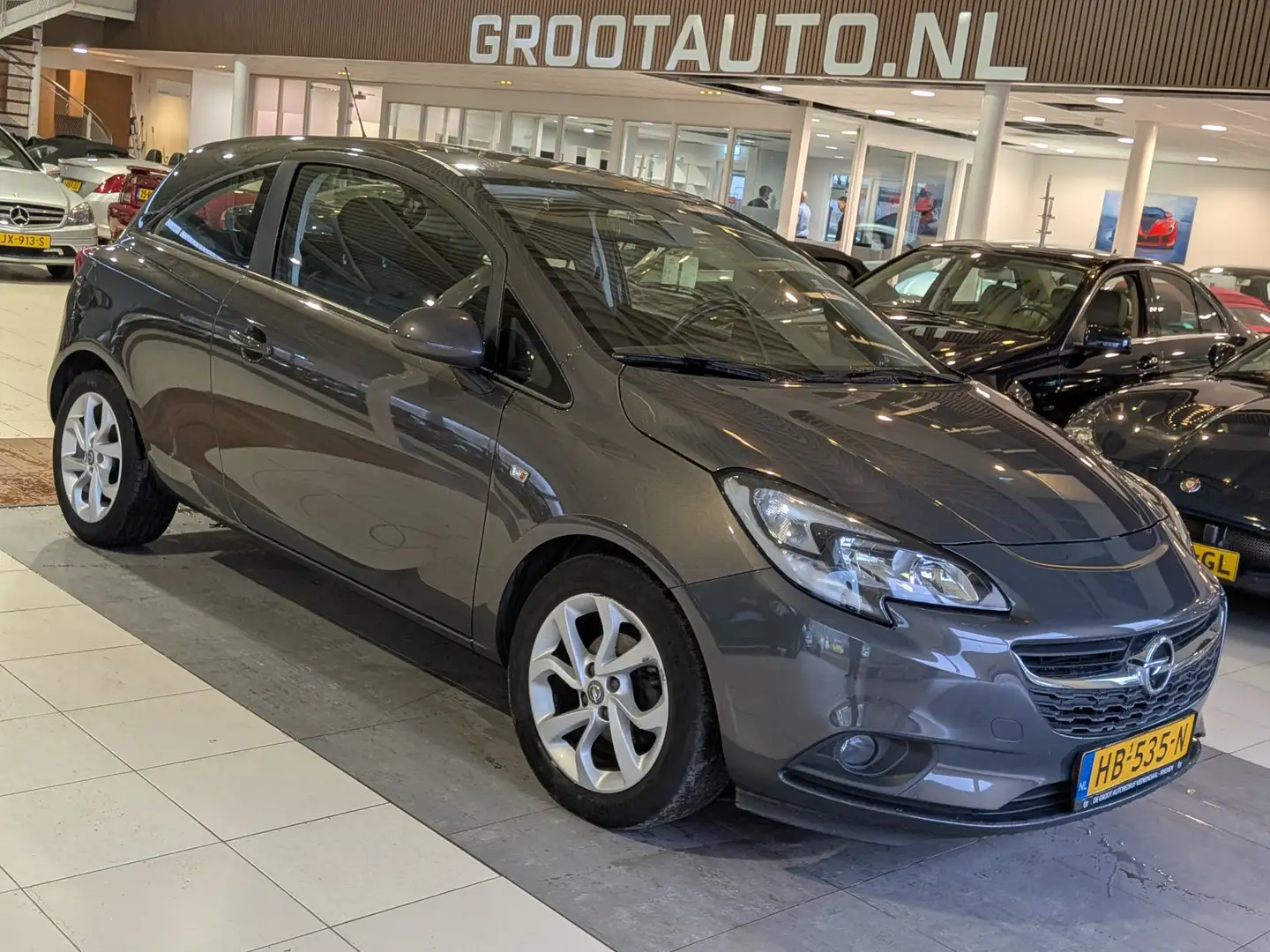 Opel Corsa 1.4 Edition NAP, Airco, Cruise control, Stuurbekra Grijs - 1