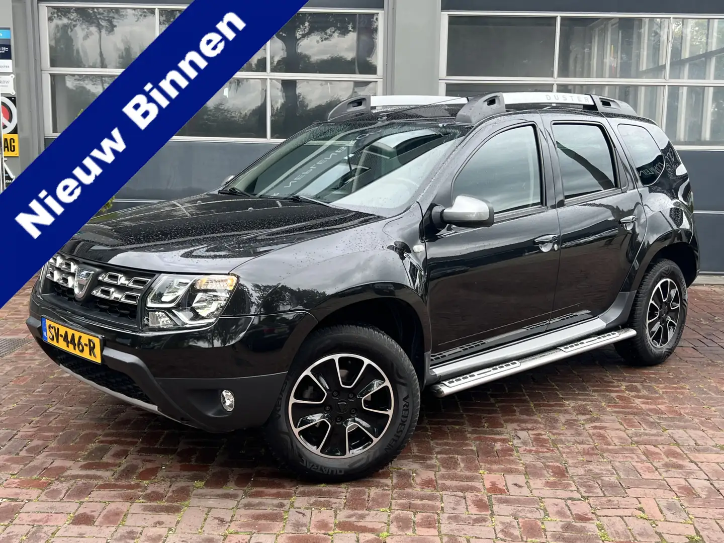 Dacia Duster 1.2 TCe 4x2 Lauréate 2016 Navi Leder Top staat Lag Zwart - 1