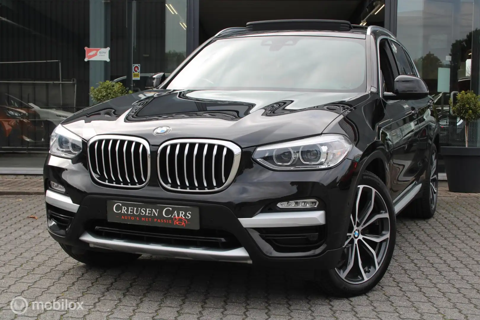 BMW X3 xDrive20i High Executive/Pano/Leder/H&K Zwart - 2