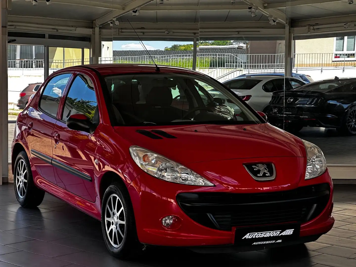 Peugeot 206 + Basis Rouge - 1
