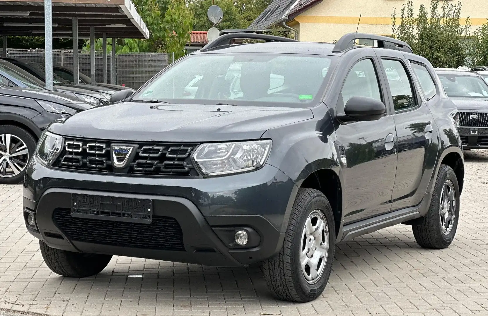 Dacia Duster II Comfort 8x bereift Navi*SHZ*Tempomat Gris - 1