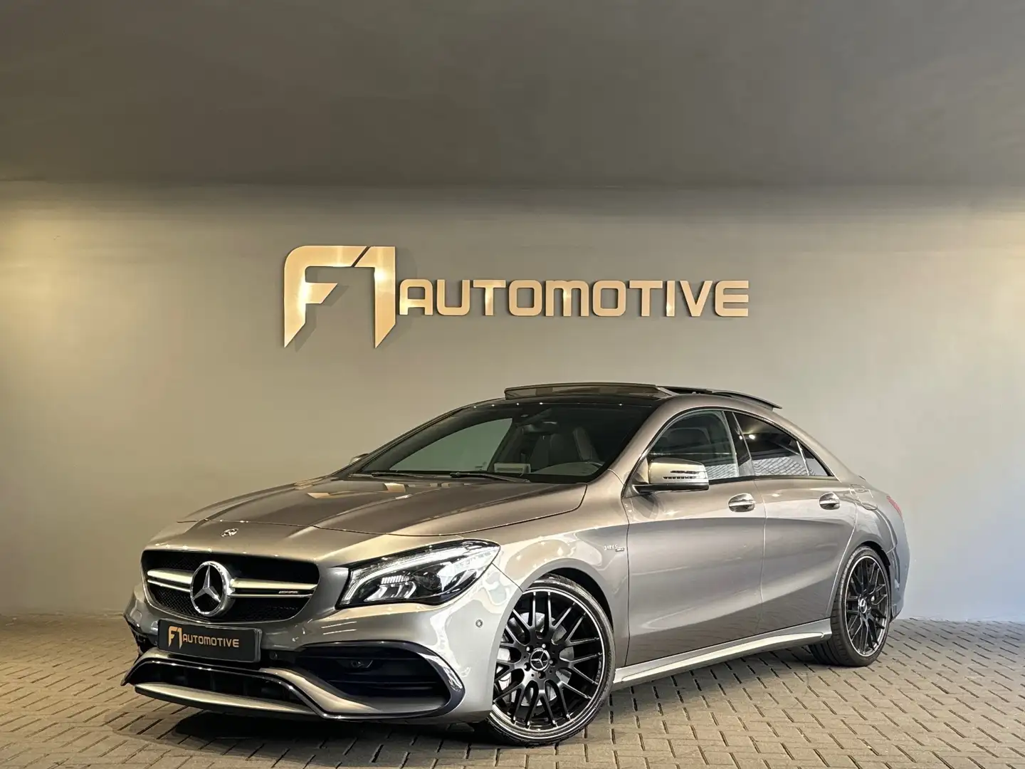 Mercedes-Benz CLA 45 AMG 4MATIC Pano|Camera|Sfeer|Night Gris - 1
