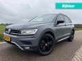 Volkswagen Tiguan 2.0 TSI 4M. HIGHLINE / AUTOMAAT / PANO / BOMVOLL Grijs - thumbnail 1