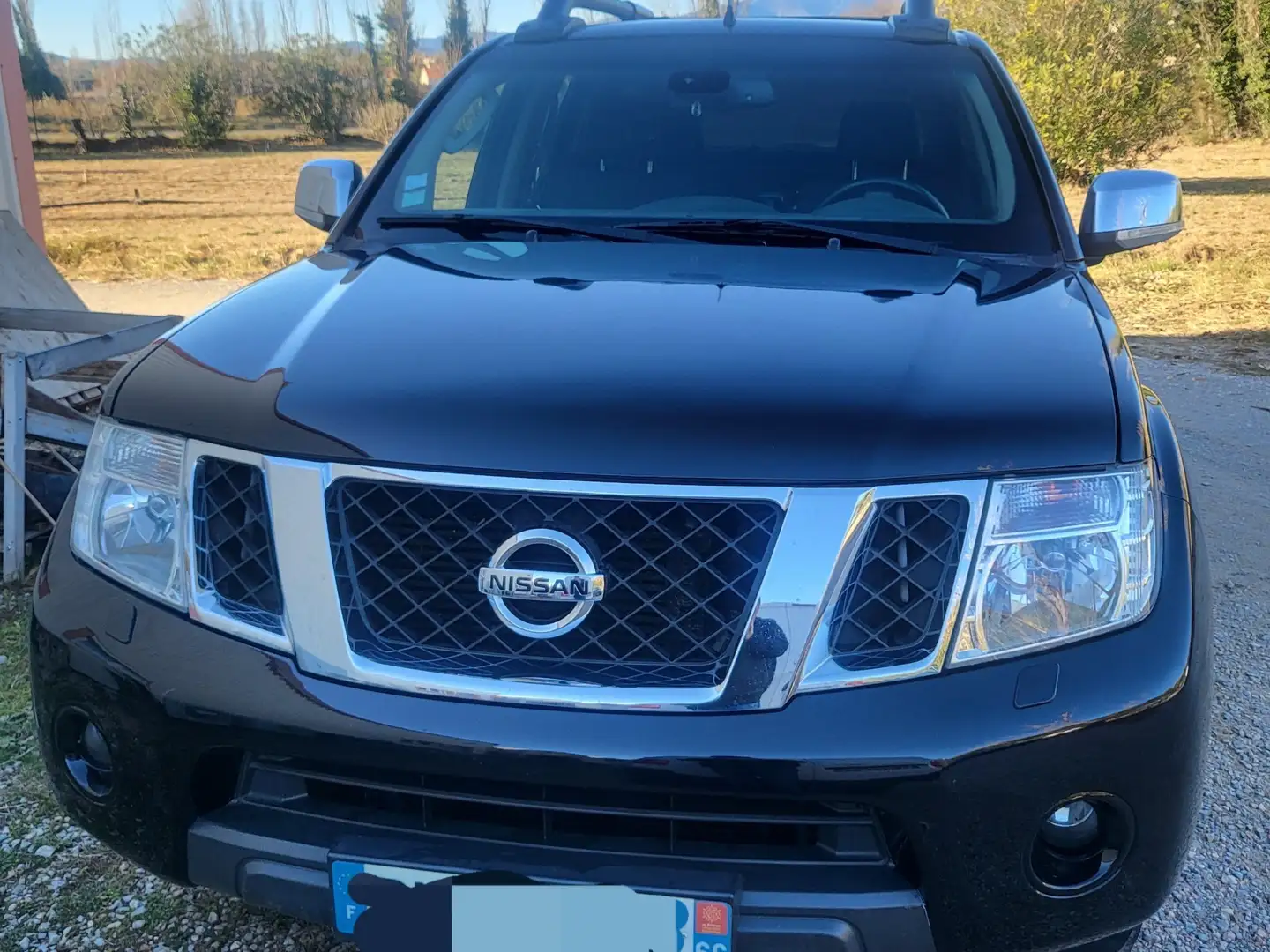 Nissan Navara 2.5 dCi 190 Euro 5 Double Cab LE A Noir - 1