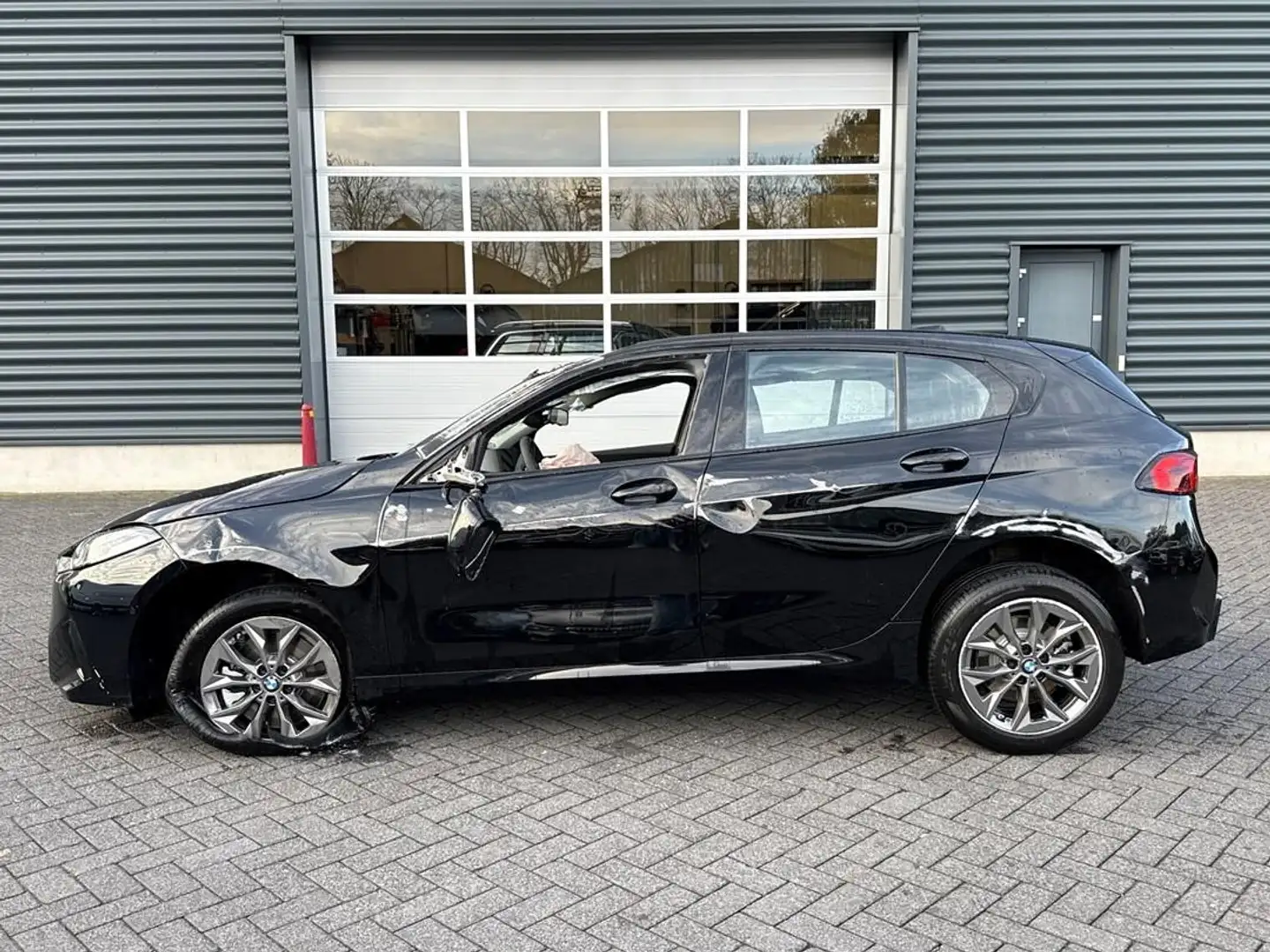 BMW 123 1-serie xDrive, navigatie, camera, PDC Zwart - 2