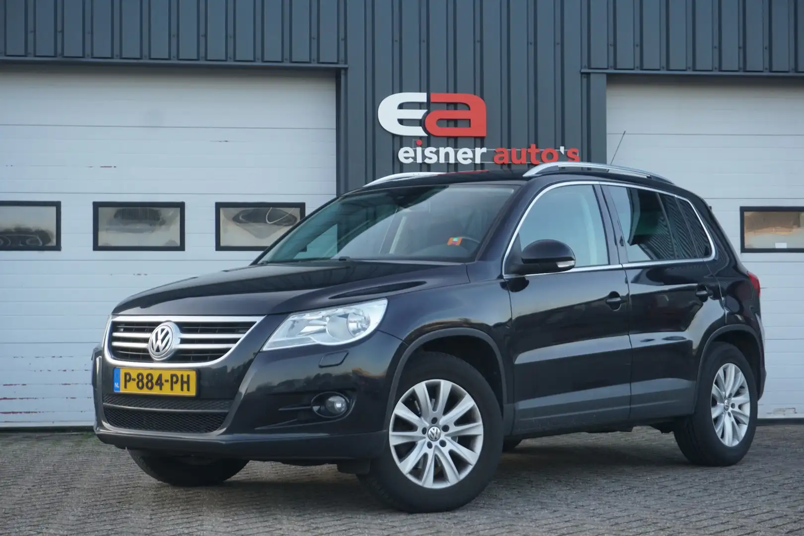 Volkswagen Tiguan 1.4 TSI Comfort&Design | PANO DAK | TREKHAAK | STO Schwarz - 1