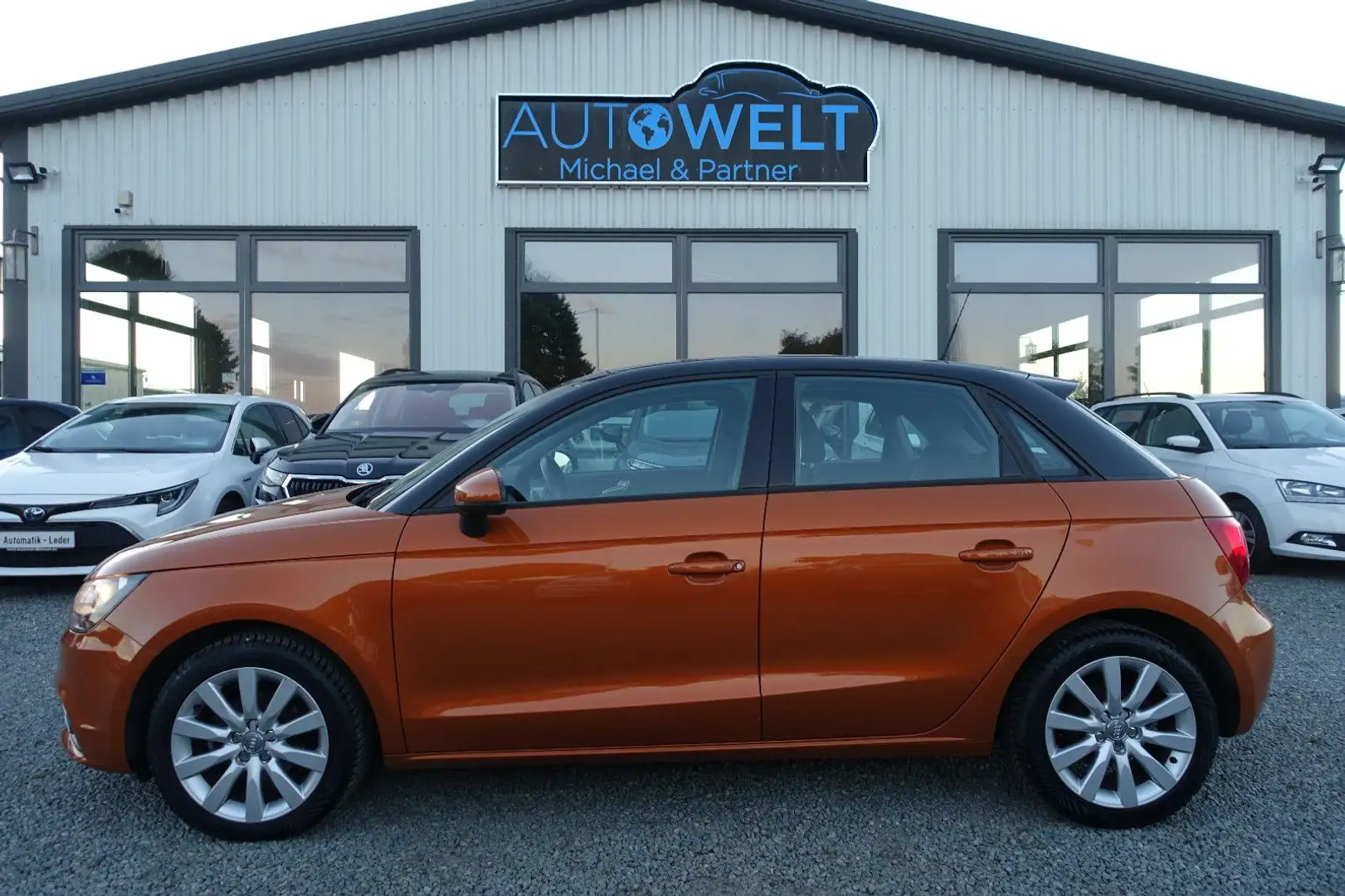 Audi A1 1.6 TDI KLIMAAUT PANO NAV SITZH TÜV+Insp.Neu Orange - 1