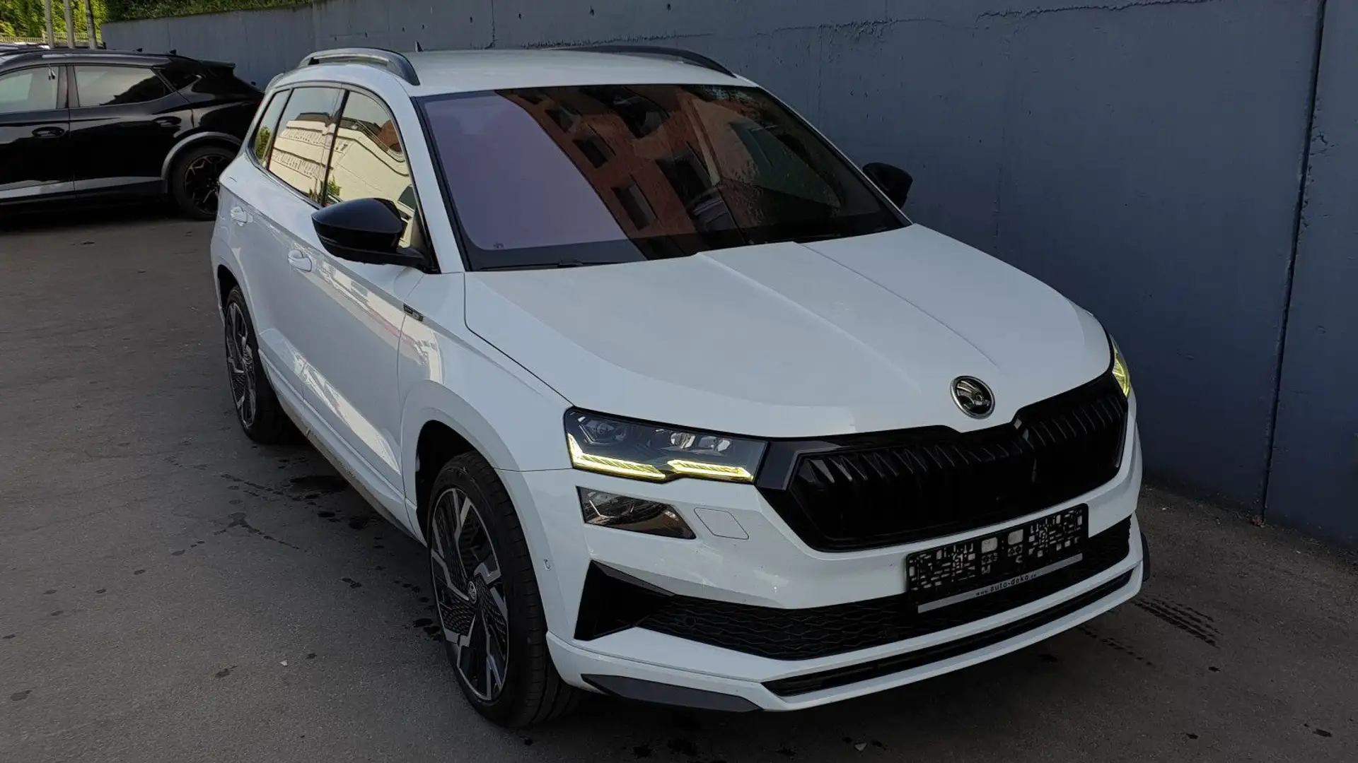Skoda Karoq 2.0 TDI DSG 4x4 SPORTLINE *Facelfift* Pano Wit - 2