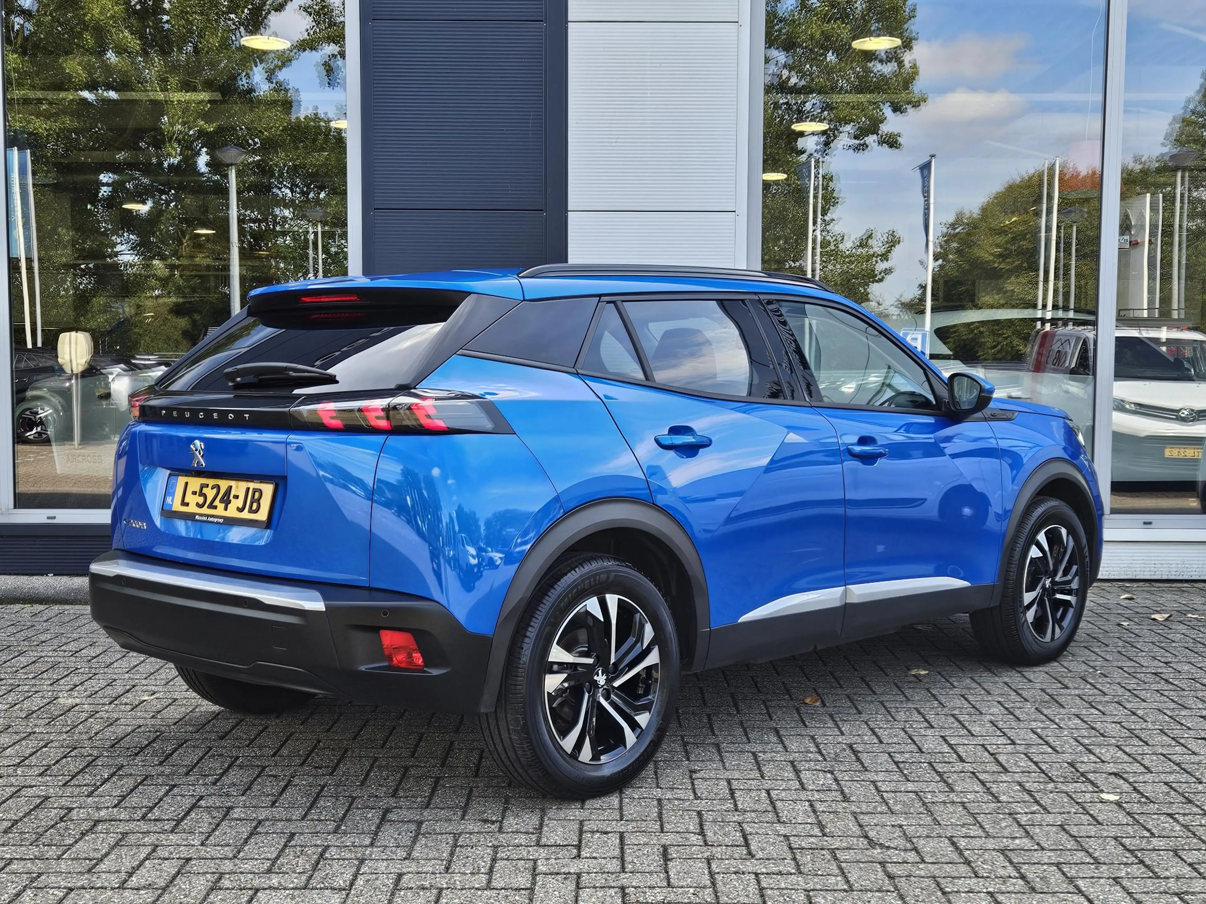 Peugeot e-2008 EV Blue Lease Allure 50 kWh | Cruise Control | Cli — photo 5