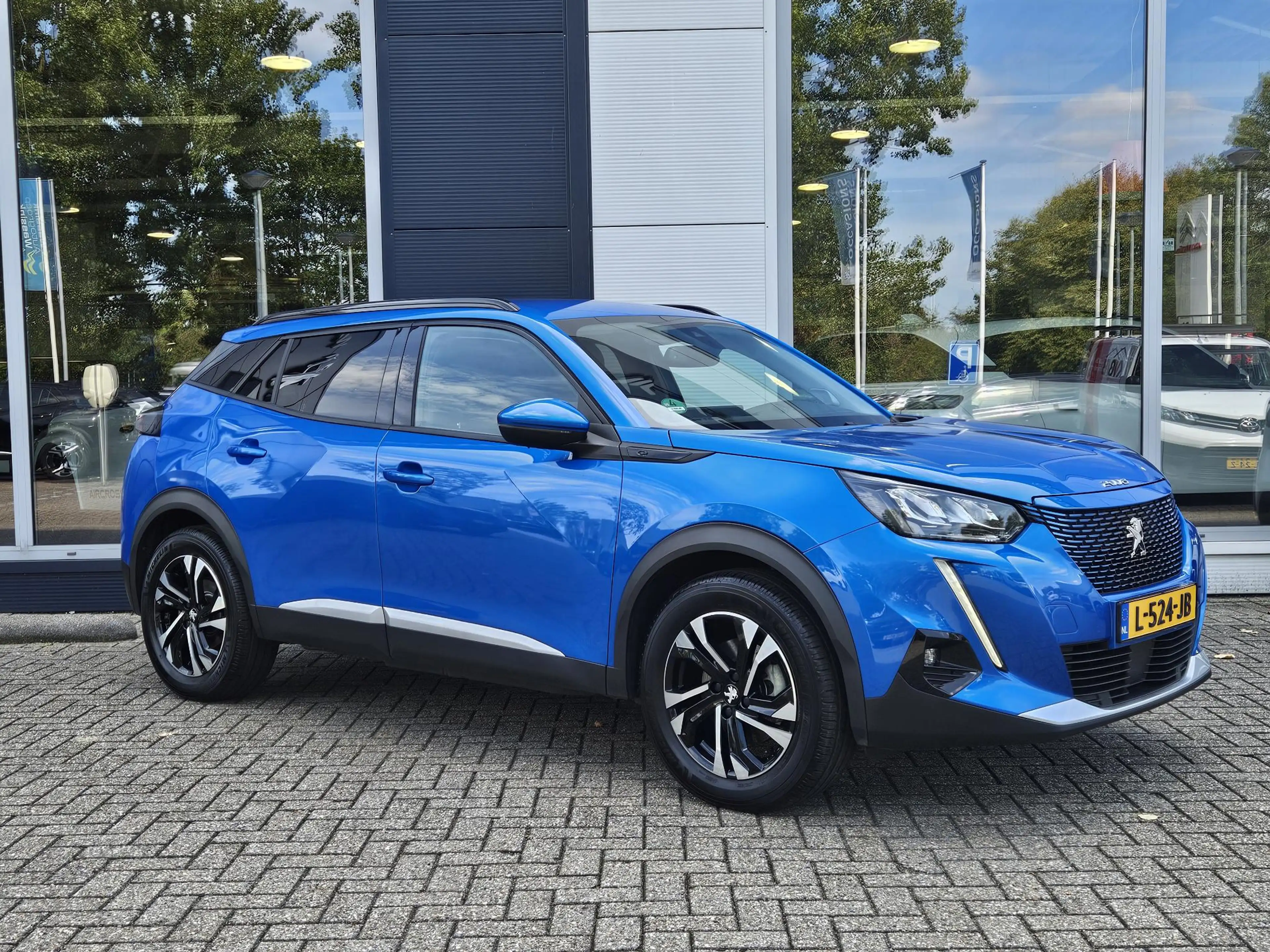 Peugeot e-2008 EV Blue Lease Allure 50 kWh | Cruise Control | Cli — photo 2