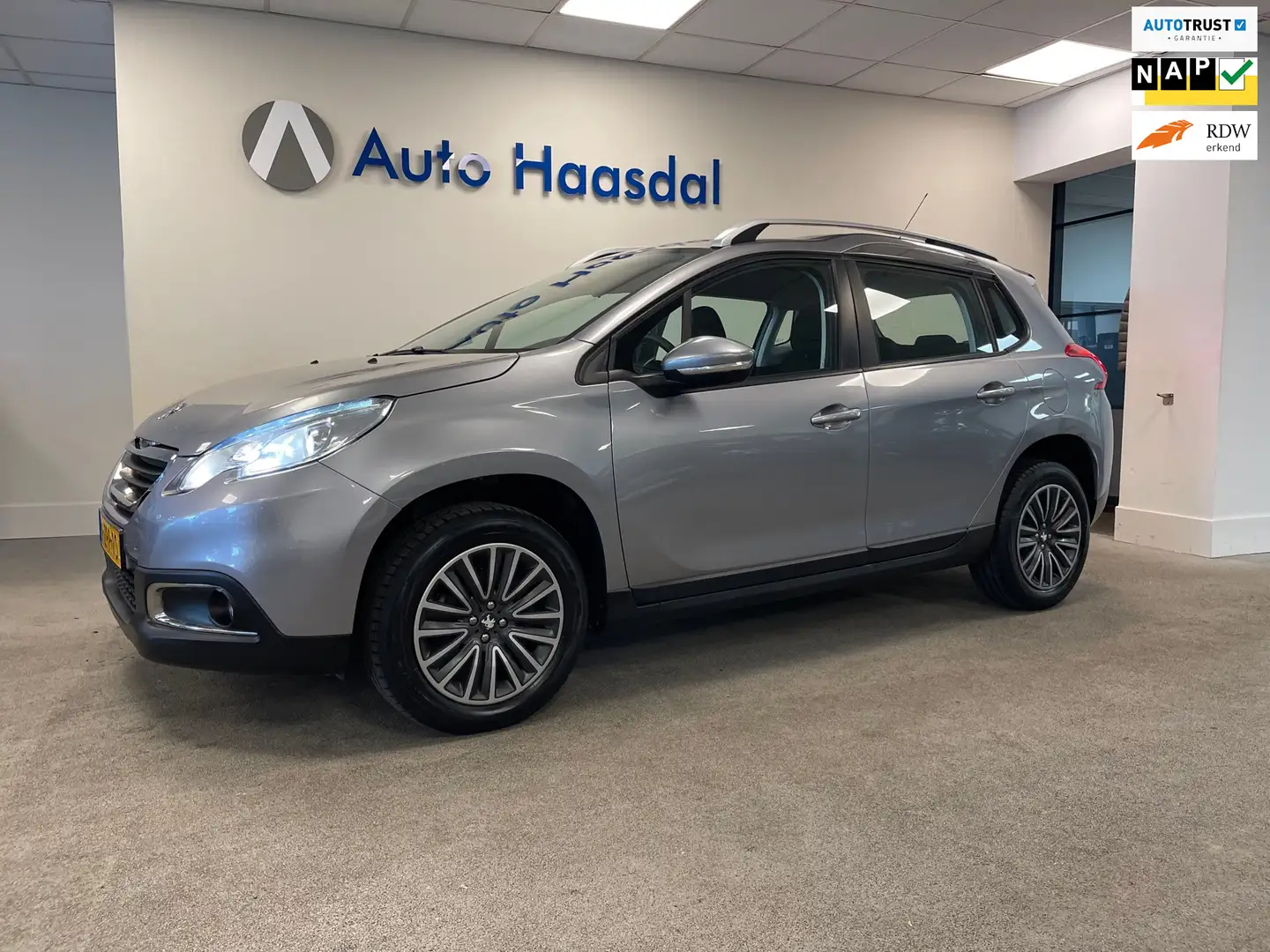 Peugeot 2008 1.2 PureTech Active|1E EIGENAAR|UNIEKE KM STAND! Grijs - 1