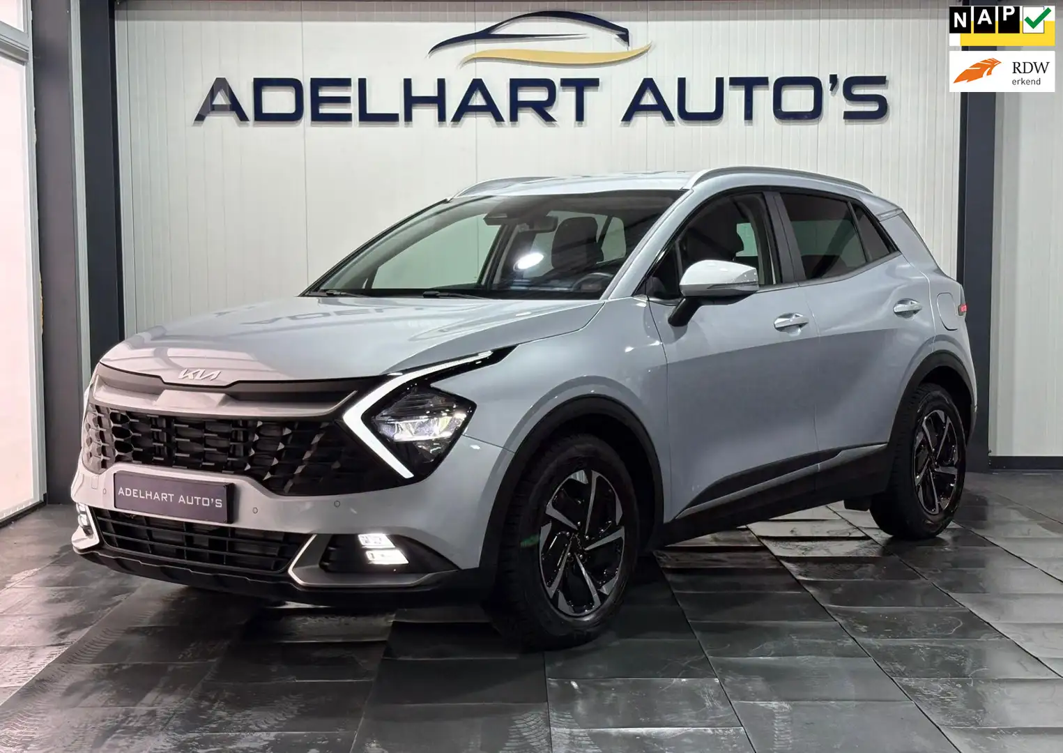 Kia Sportage 1.6 T-GDi MHEV DynamicLine / Navigatie full map / Silber - 1