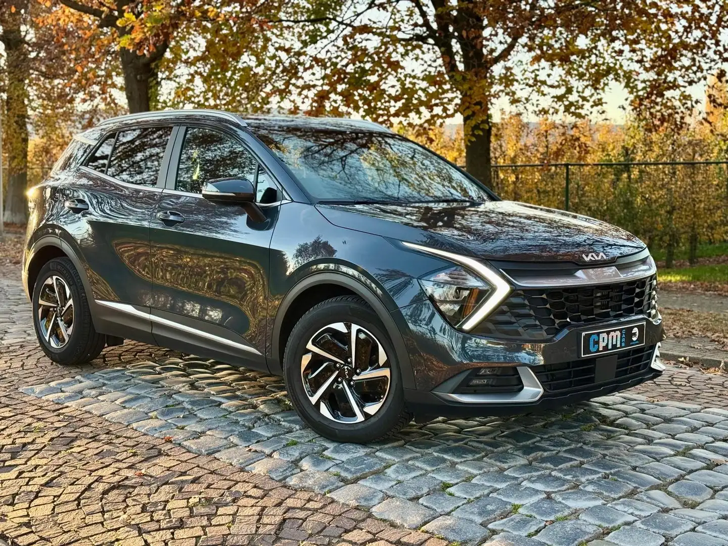 Kia Sportage 1.6T-GDI Hybrid Aut. * FULL HISTORIEK * CAMERA * Grijs - 1