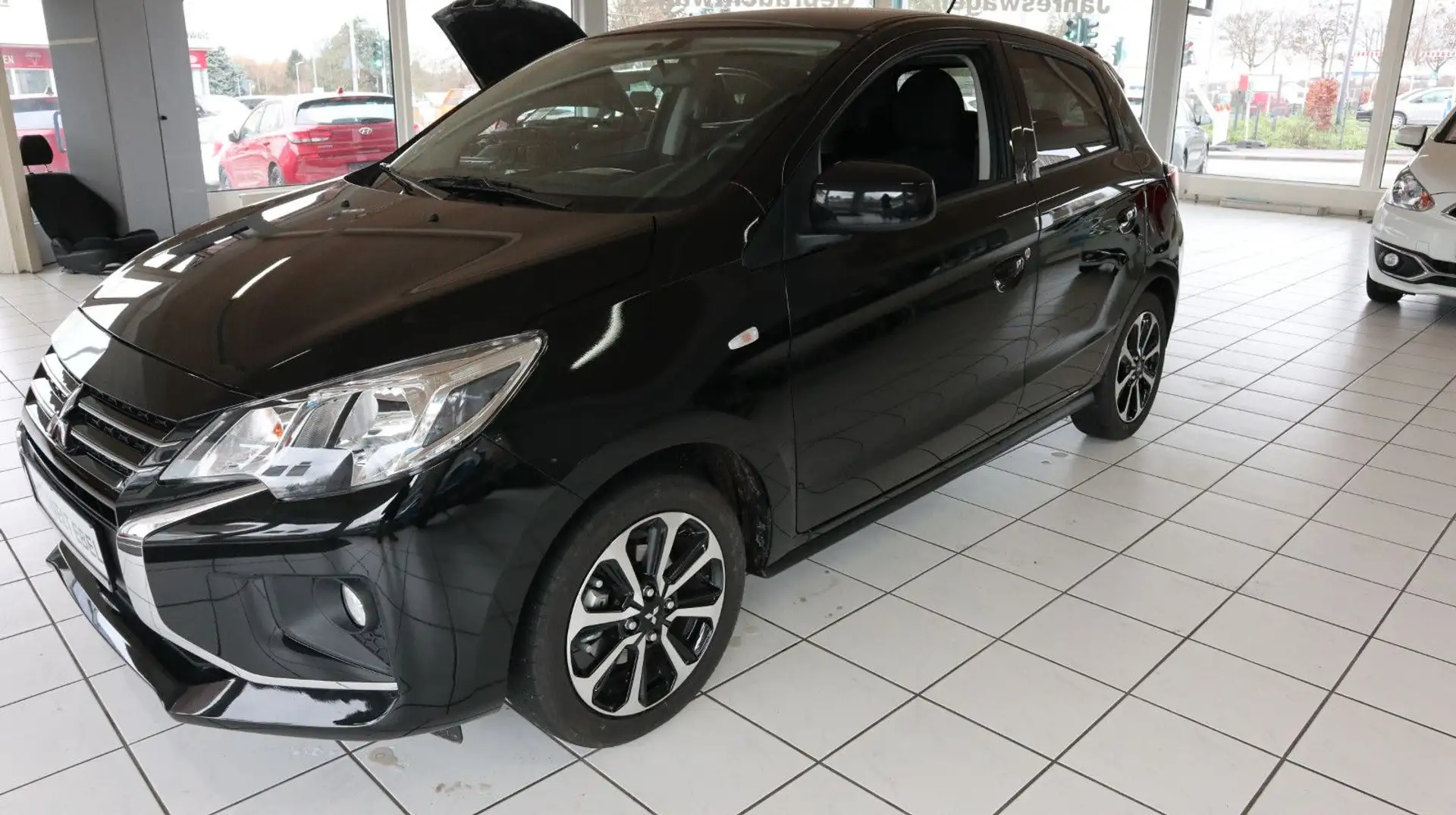 Mitsubishi Space Star *AUTOMATIK*NAVI*1.HAND*TÜV+INSP. NEU* Schwarz - 1