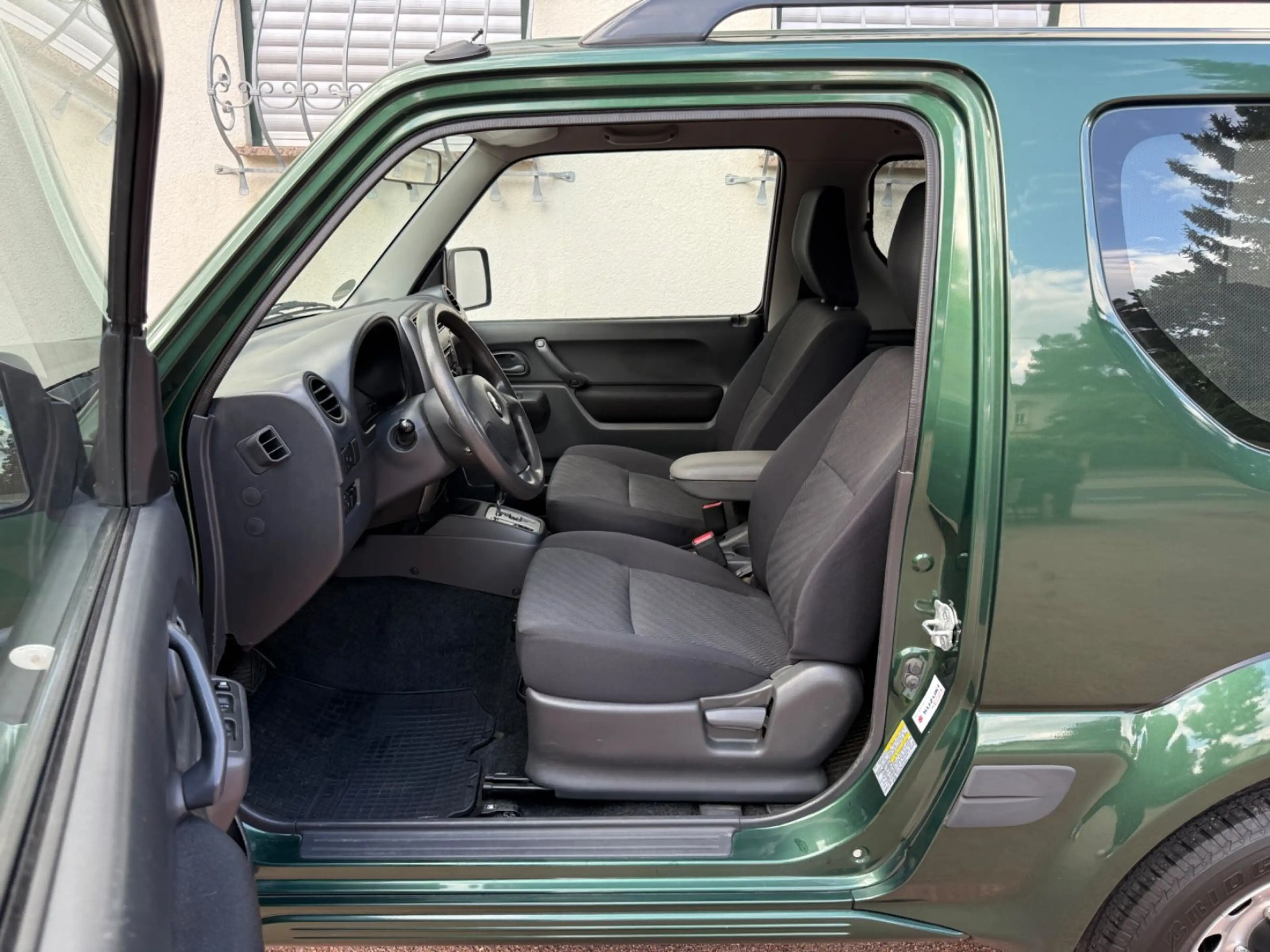 Suzuki Jimny 4x4 KLIMA 19%Mwst.  ALLWETTER 1.HAND AHK — photo 14