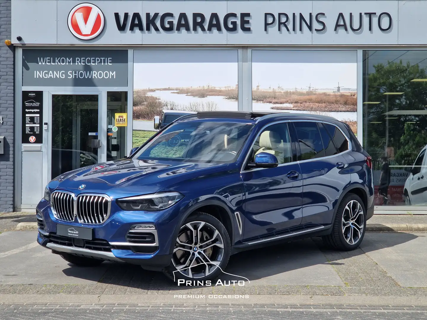 BMW X5 xDrive45e High Executive |PANO|PHYTONICBLAU|HUD|H/ Blauw - 1