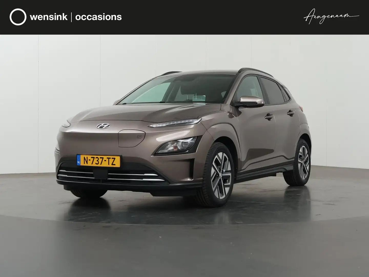 Hyundai KONA EV Fashion 64 kWh | Navigatiesysteem | Parkeercame Bruin - 1