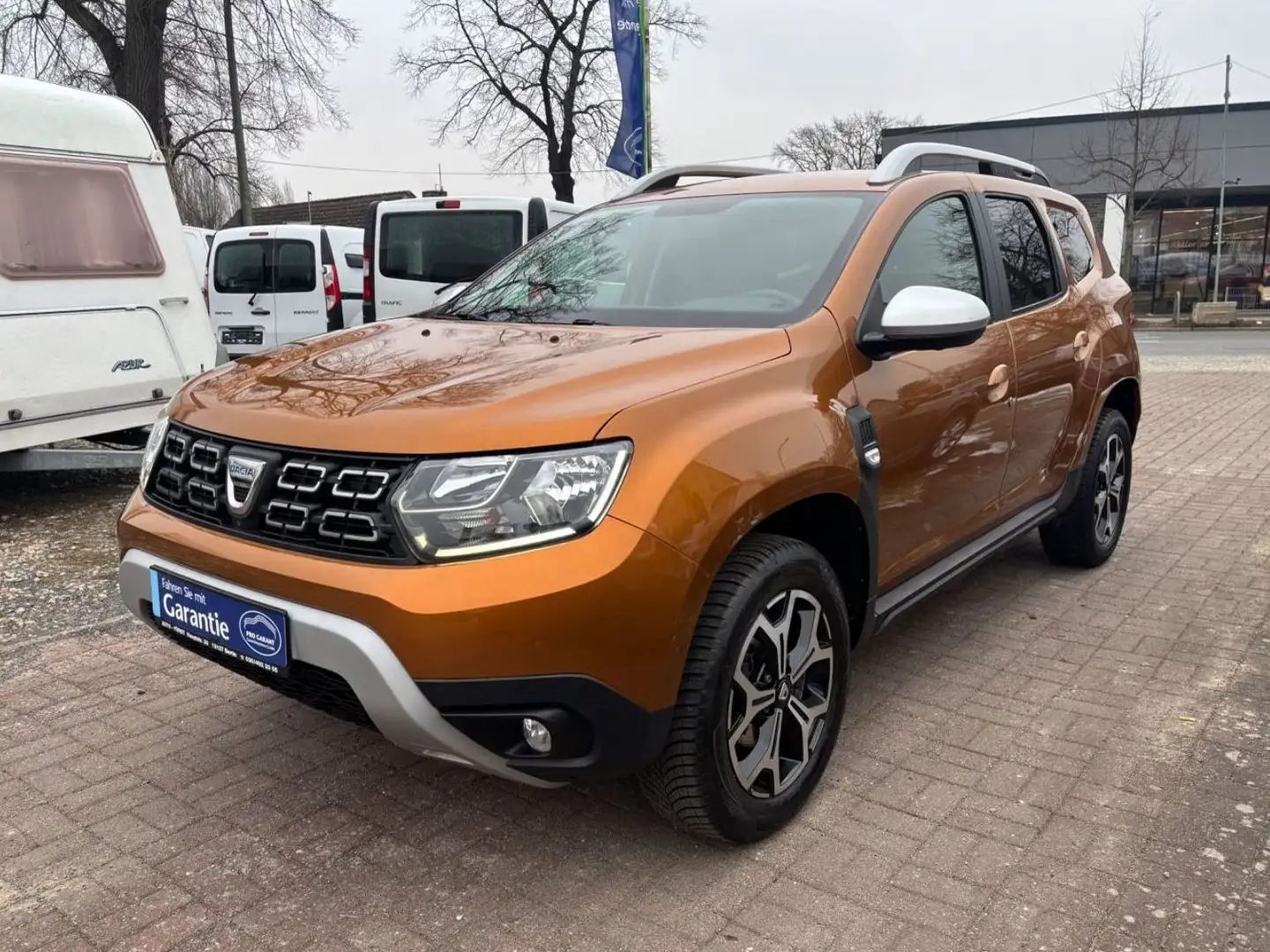 Dacia Duster II Adventure+LEDER+NAVI+TEMPOMAT+R.KAMERA Orange - 1