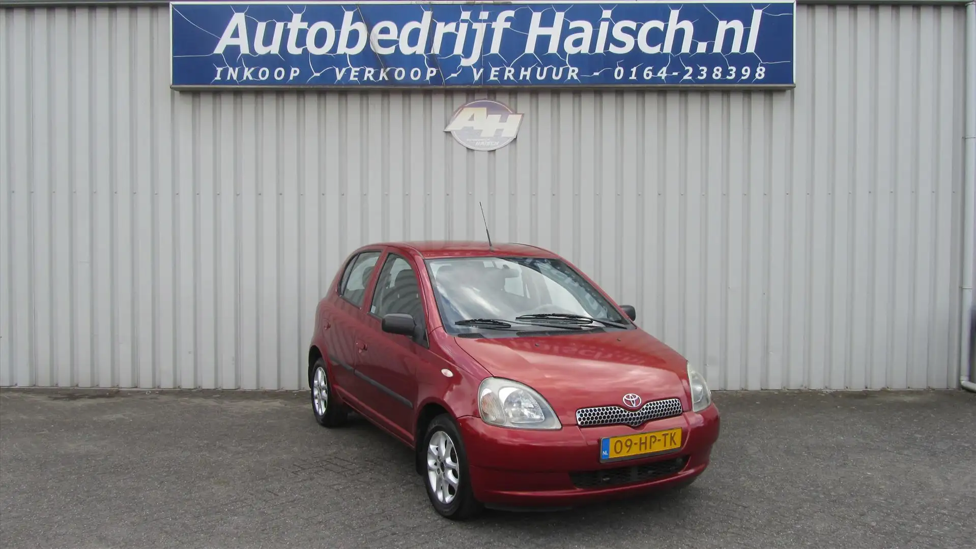 Toyota Yaris 1.3 16V 5 DRS + Airco Rood - 1